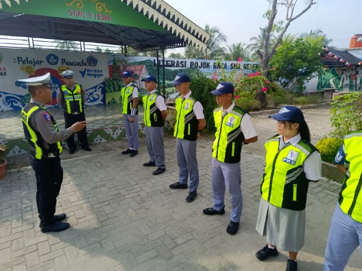 Sat Lantas Polres Pelabuhan Belawan Latih PKS di SMA Negeri 9 Medan